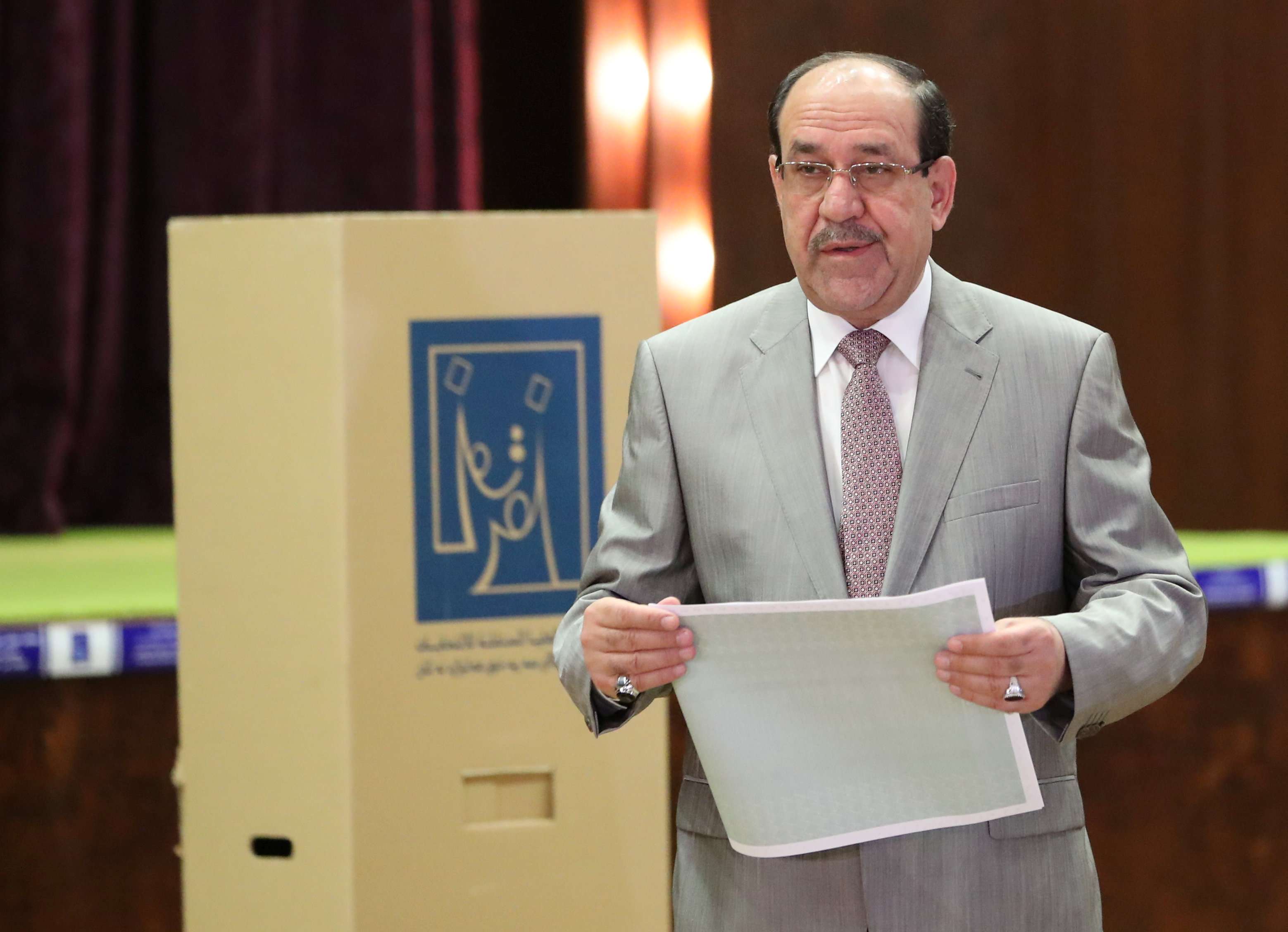 المالكي أثناء الاقتراع