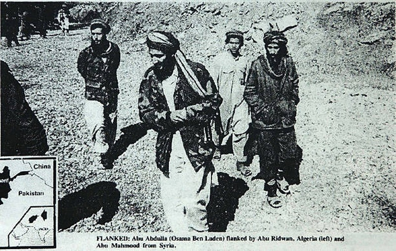 Enaam Arnaout, head of an Illinois Islamic charity, who was shown in the same Arab News report walking next to Bin Laden.