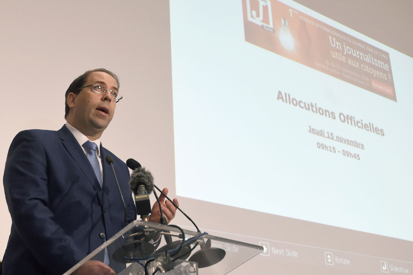 Tunisian Prime Minister Youssef Chahed delivers a speech during the opening of the Assises Internationales du Journalisme in Tunis.