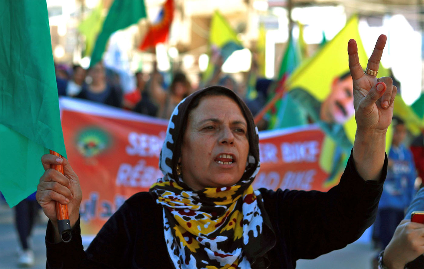 Syrian kurds demonstrate in Qamishli against Turkish shelling of Kurdish militia posts in northern Syria