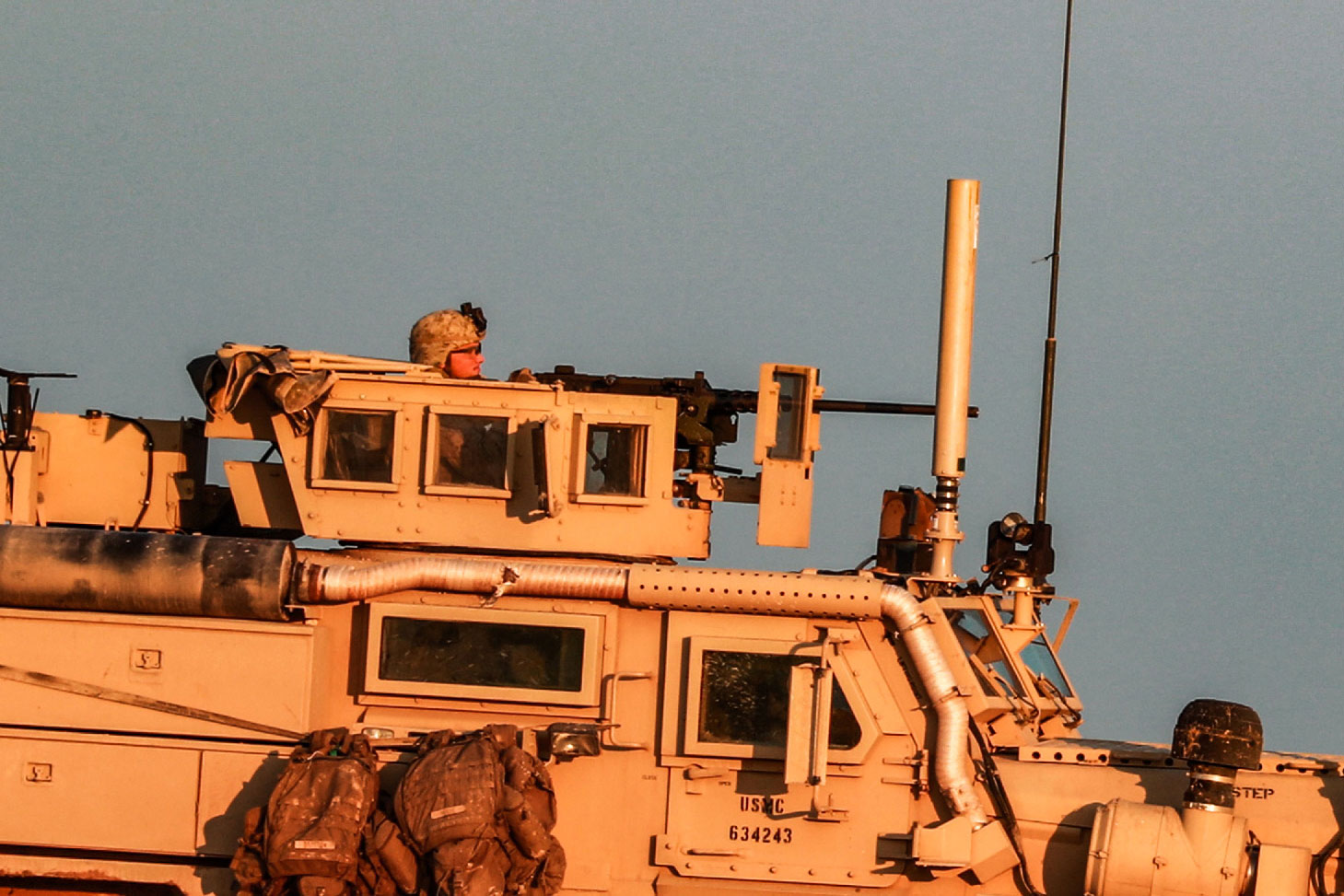 A US Marine Corps tactical vehicle is seen driving along a road near the town of Tal Baydar in the countryside of Syria's northeastern Hasakeh province on December 21, 2018.