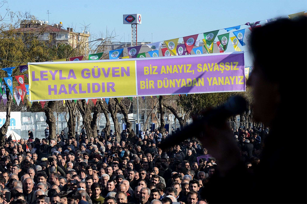 Protesters gather under a banner reading "Leyla Guven is right" during a rally in the Kurdish-majority city of Diyarbakir