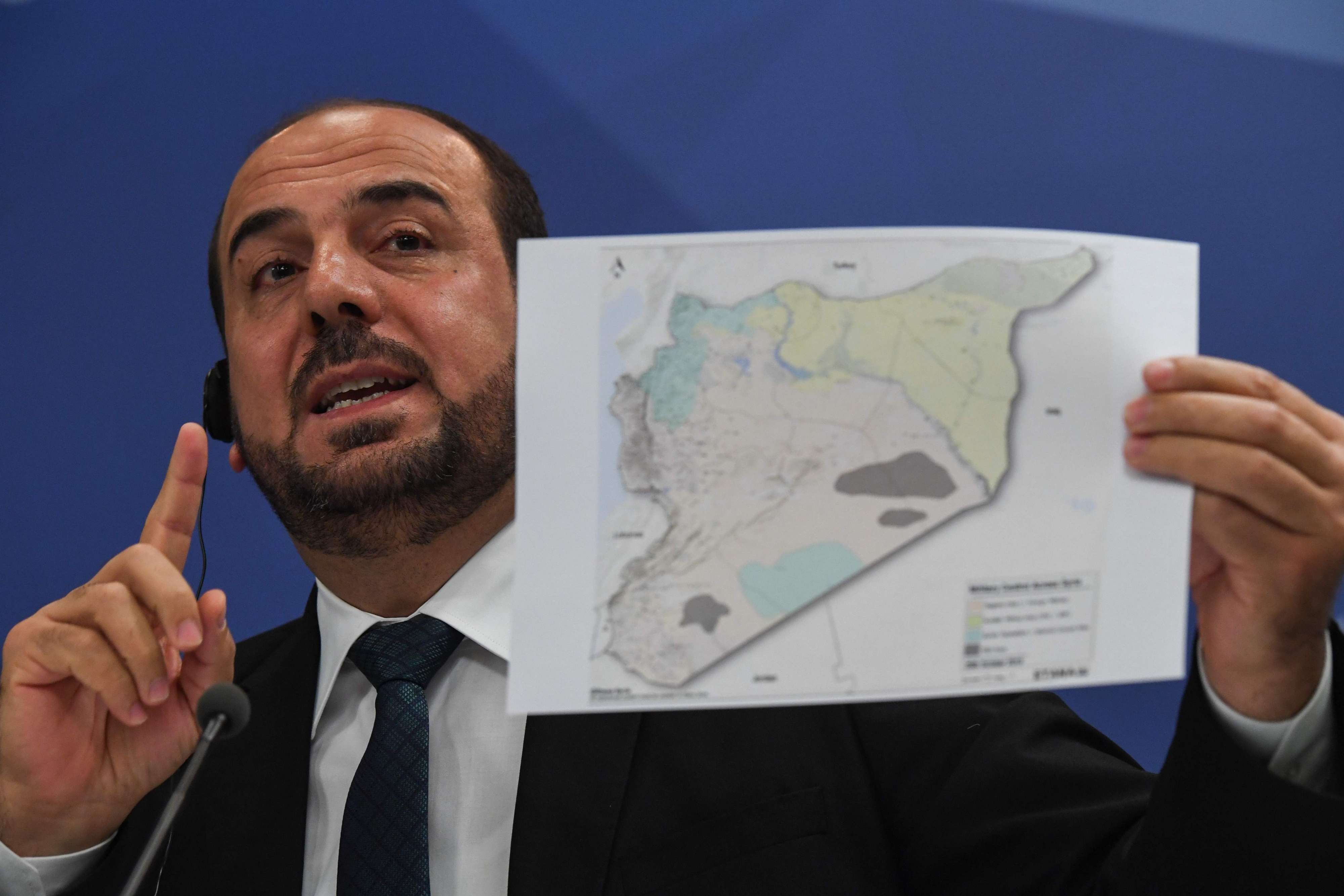 Nasr al-Hariri, the Syrian opposition's chief negotiator, gives a press conference in Moscow on October 26, 2018.