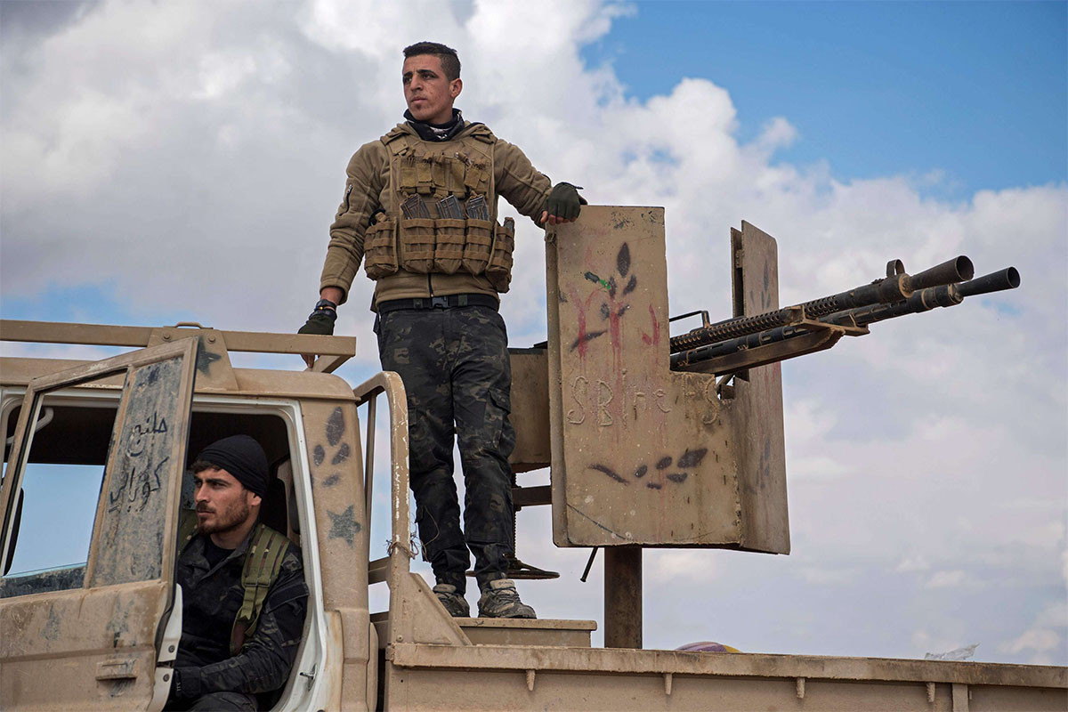 Dozens of coalition and SDF fighters were stationed at a screening point for new arrivals from IS areas