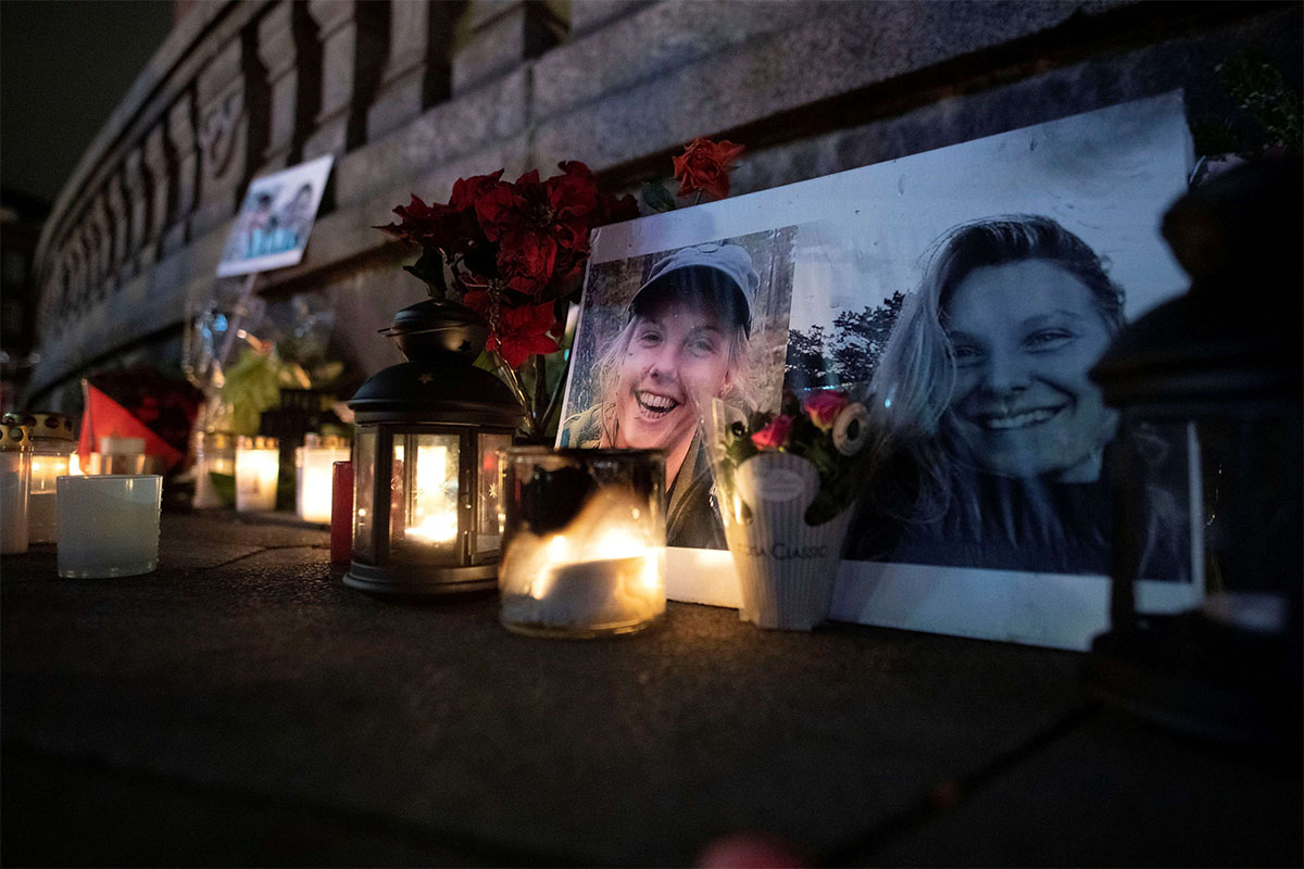Flowers and candles in memory of Louisa Vesterager Jespersen and Maren Ueland at the Town Hall Square in Copenhagen