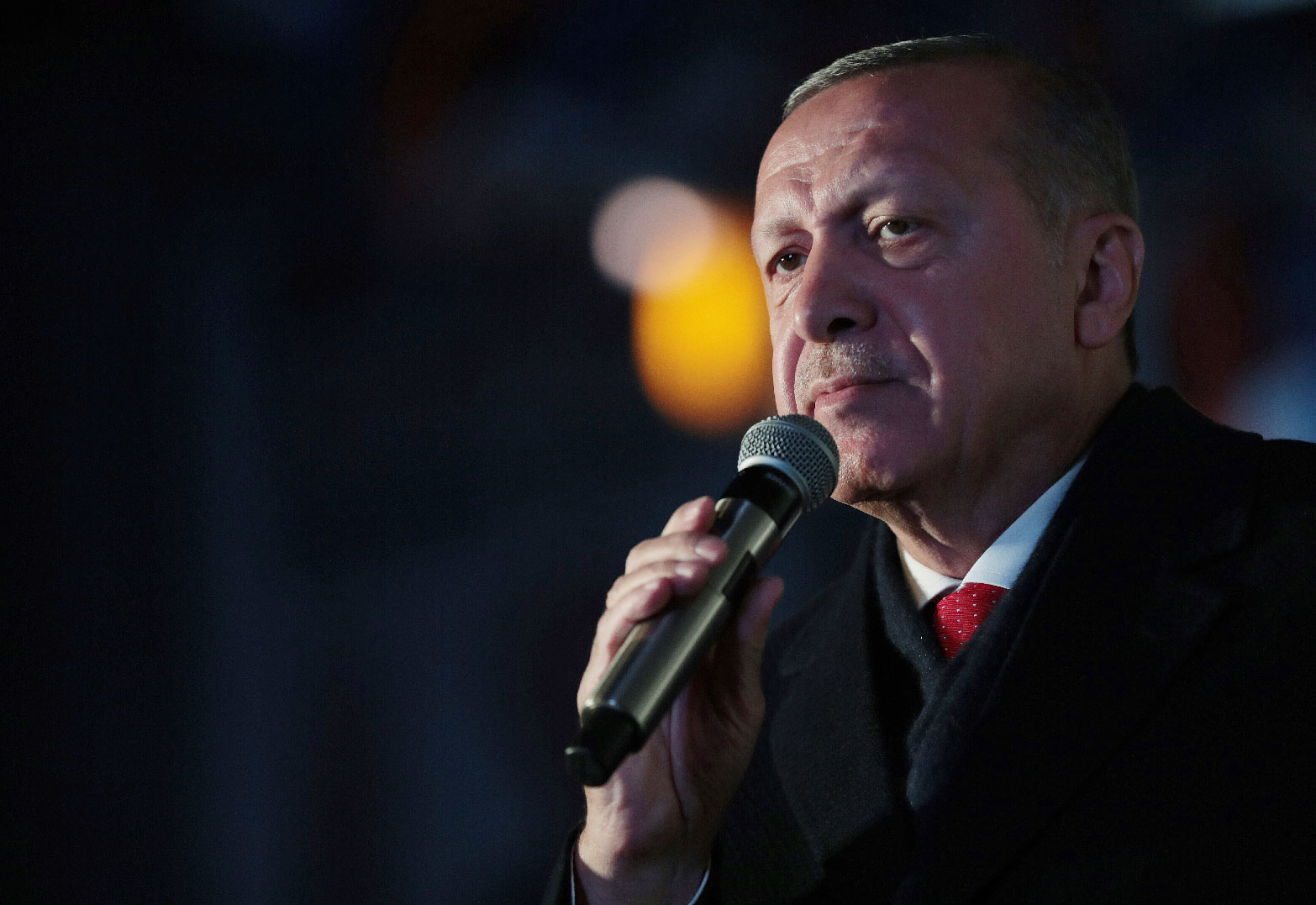 Turkey's President Recep Tayyip Erdogan addresses the supporters of his ruling Justice and Development Party, AKP, during a rally in Adiyaman, Turkey, Tuesday, March 26, 2019, ahead of local elections scheduled for March 31, 2019.