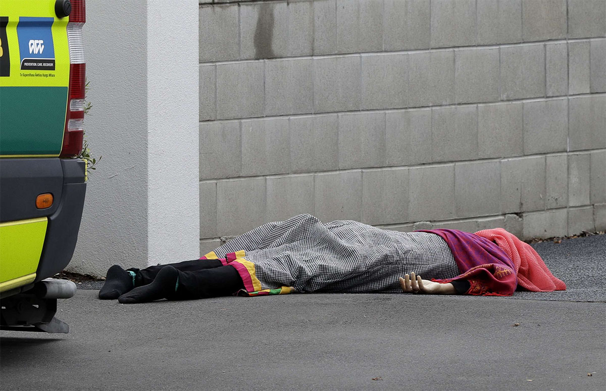 A body lies on the footpath outside a mosque in central Christchurch