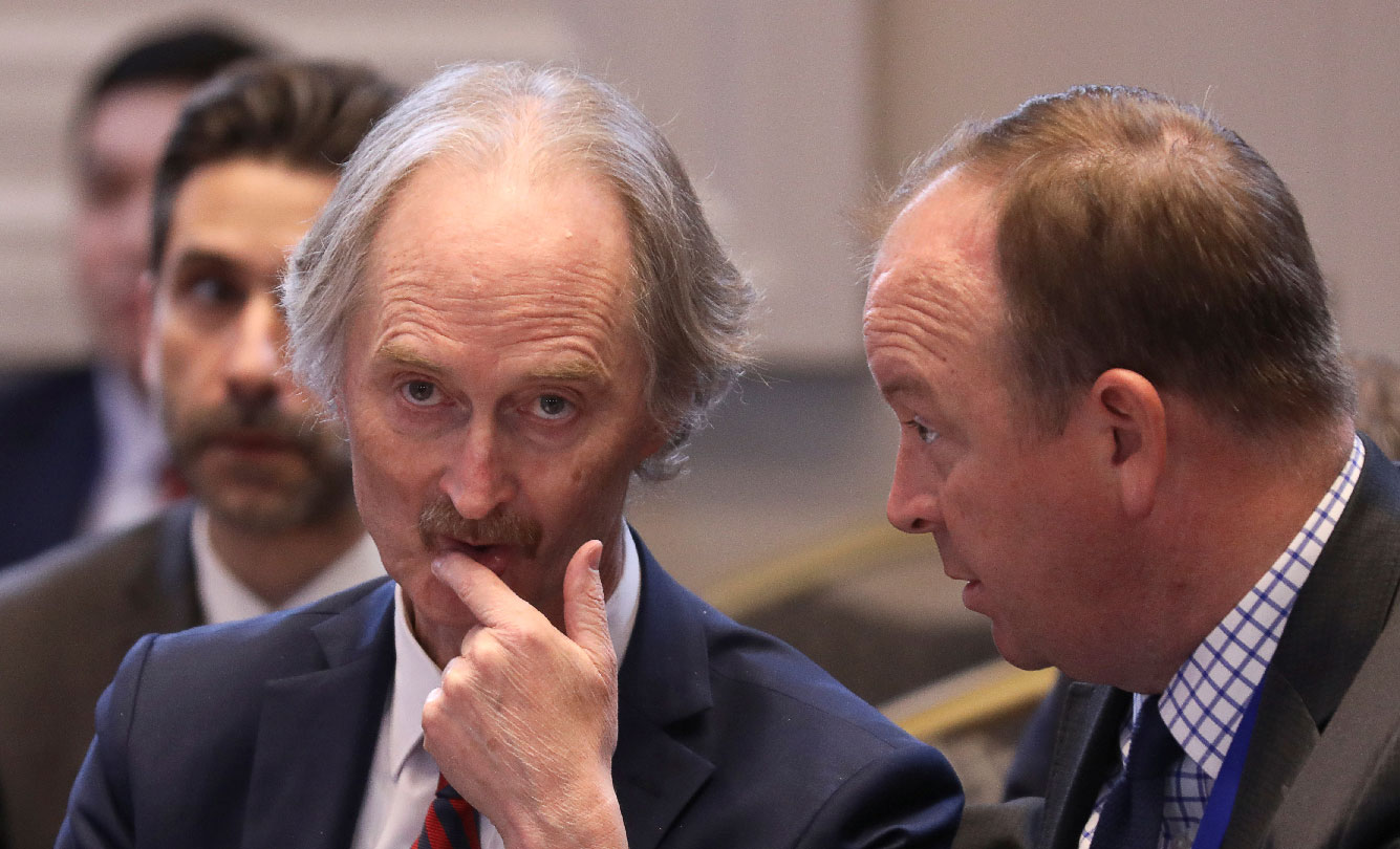 United Nations Special Envoy to Syria Geir Pedersen (L)