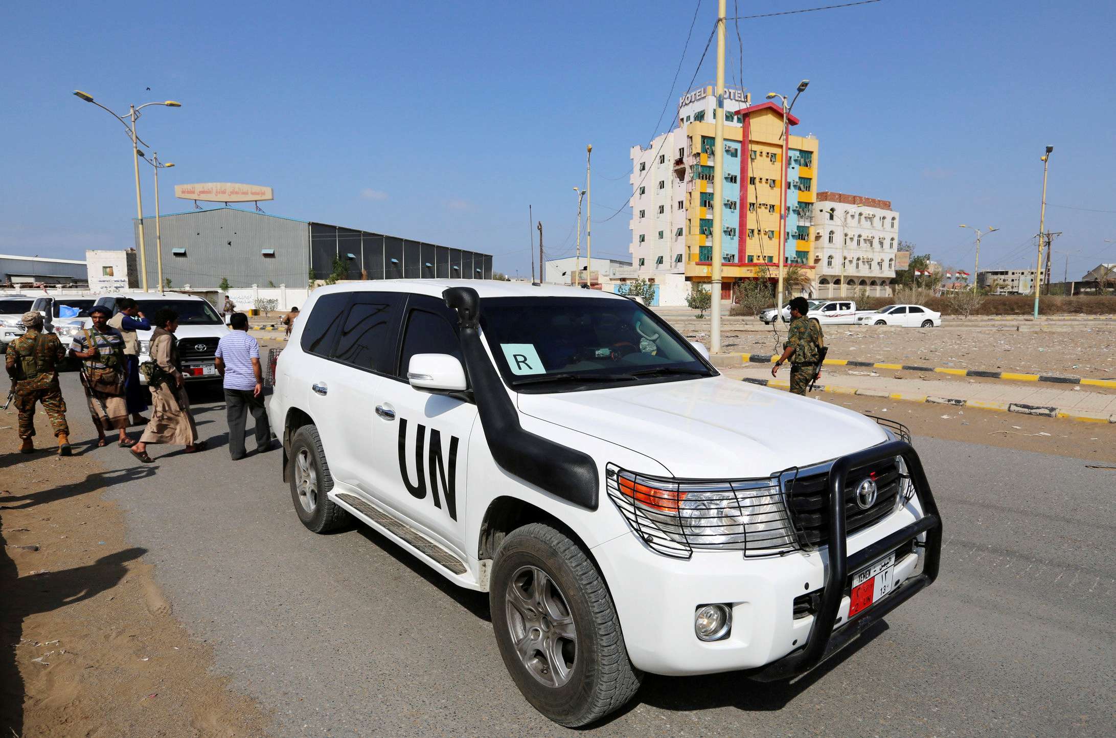 The convoy of a team from the United Nations and the World Food Program crosses from Houthi-controlled areas to a government-controlled areas to reach grain mills in an eastern suburb of Hodeidah, Yemen February 26, 2019.