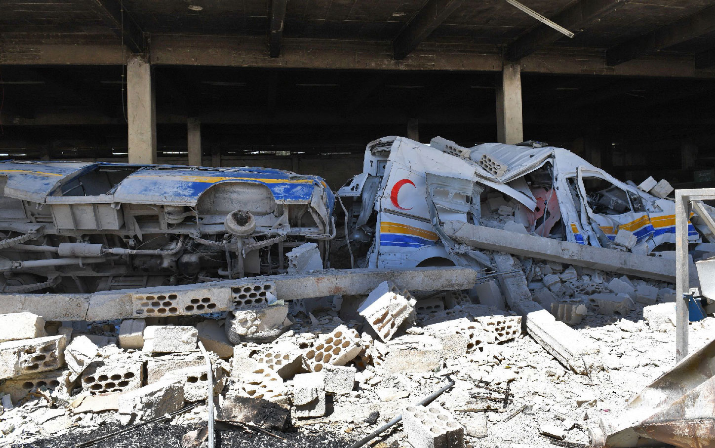 Destroyed ambulances and vehicles of the Syrian Civil Defence