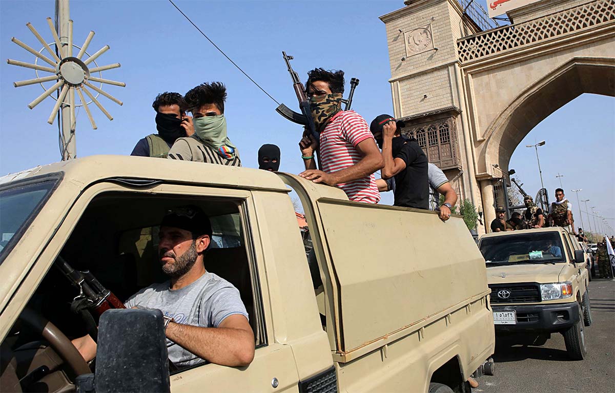 Iran-backed Shiite militias parade in Basra
