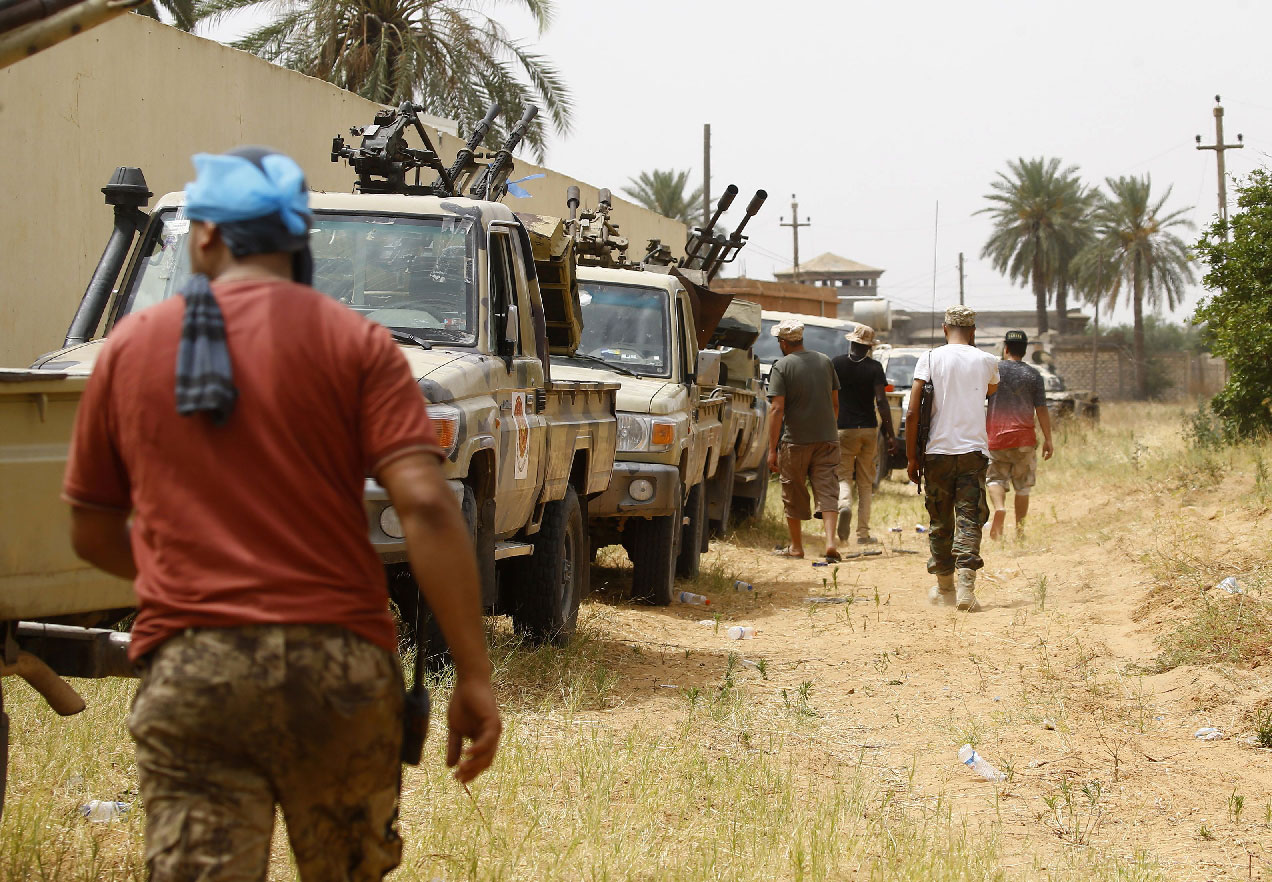 Fighters loyal to the GNA hold a position in the al-Sawani area south of Tripoli