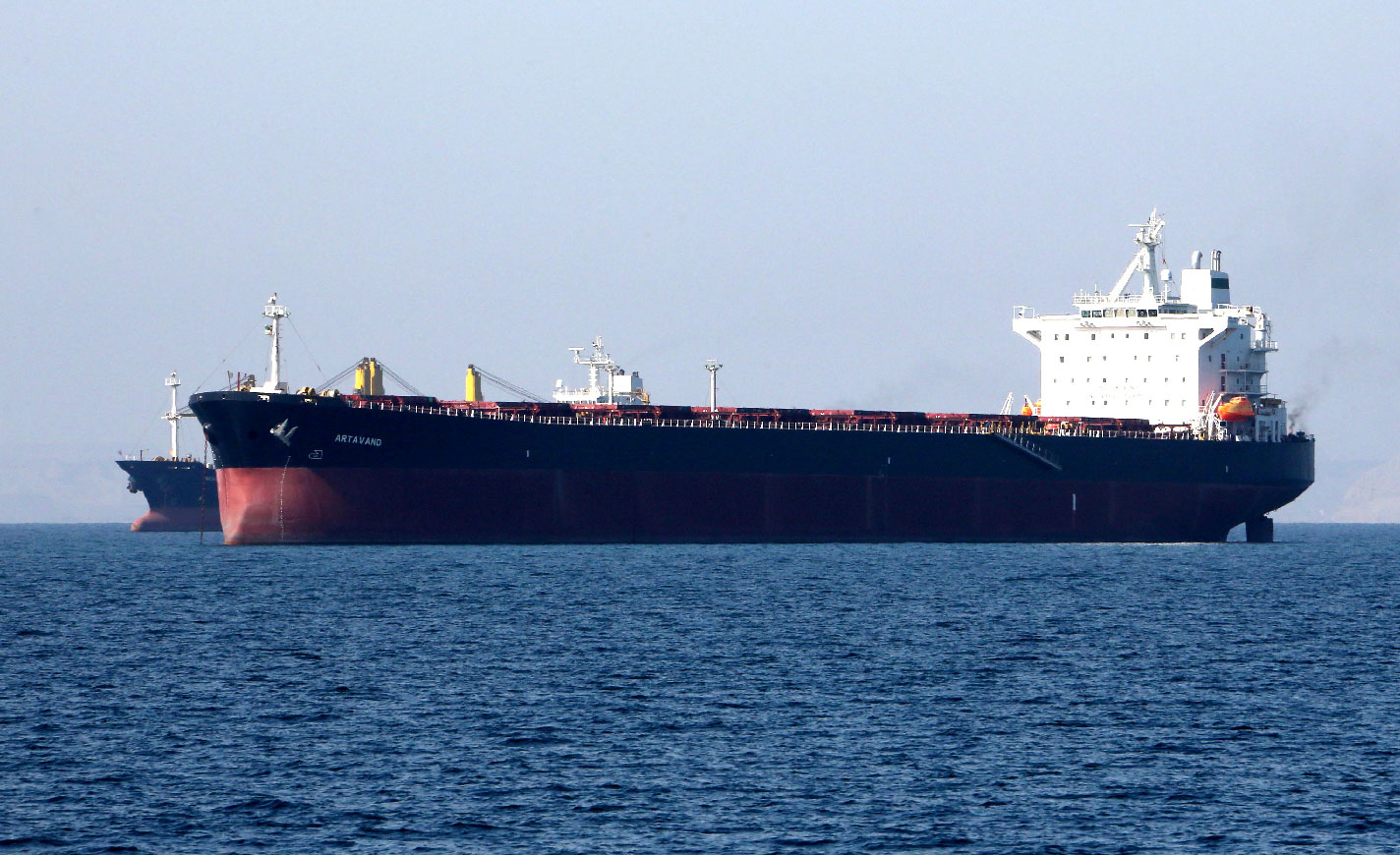 Oil tankers pass through the Strait of Hormuz