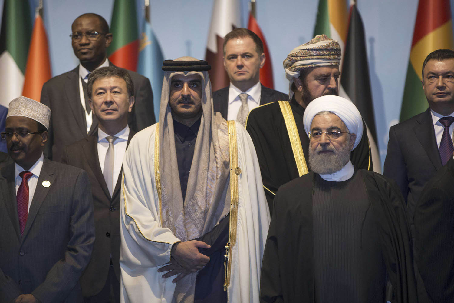 أمير قطر الشيخ تميم بن حمد والرئيس الإيراني حسن روحاني