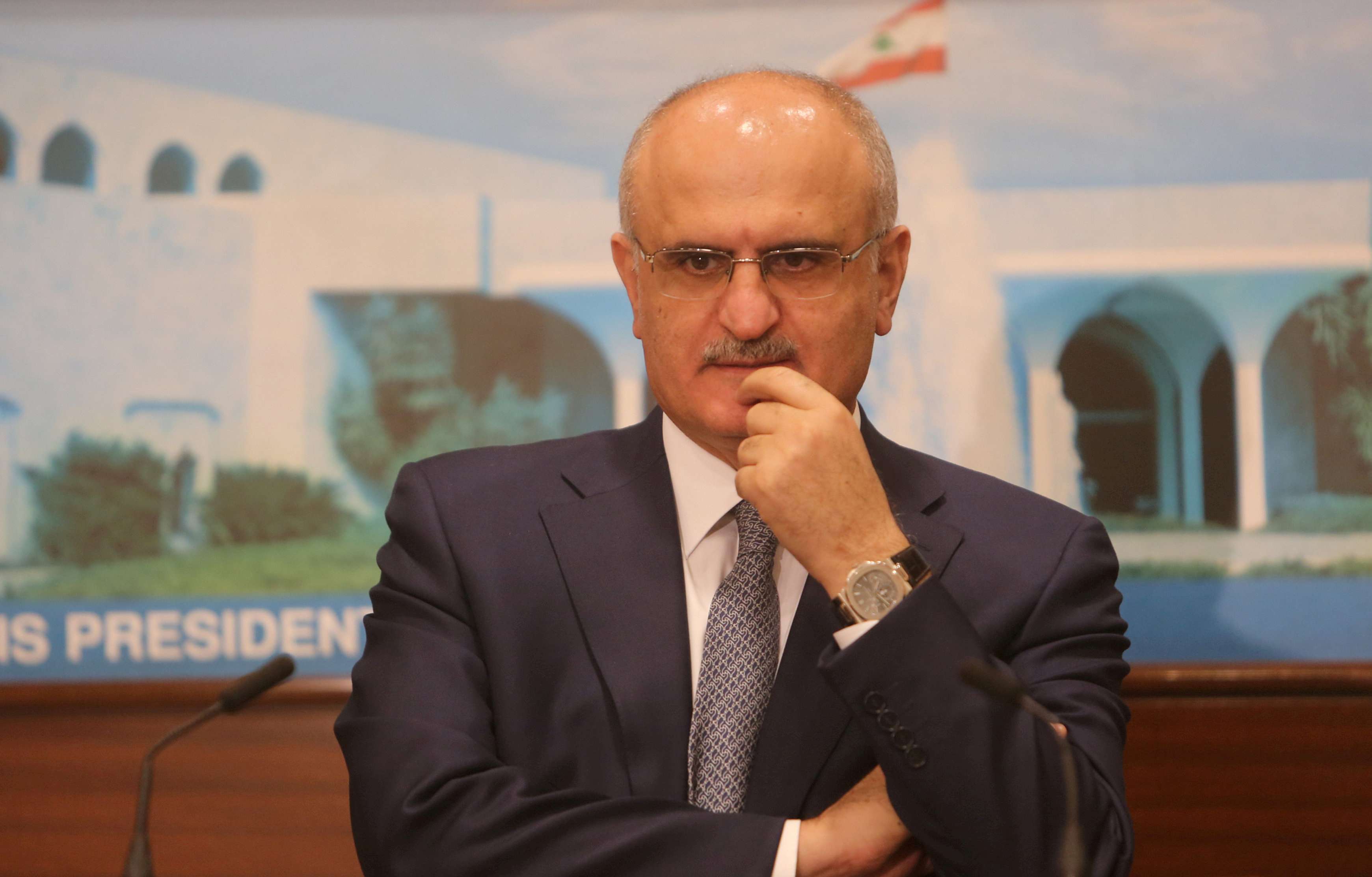 Finance Minister Ali Hassan Khalil gestures during a news conference at the presidential palace in Baabda