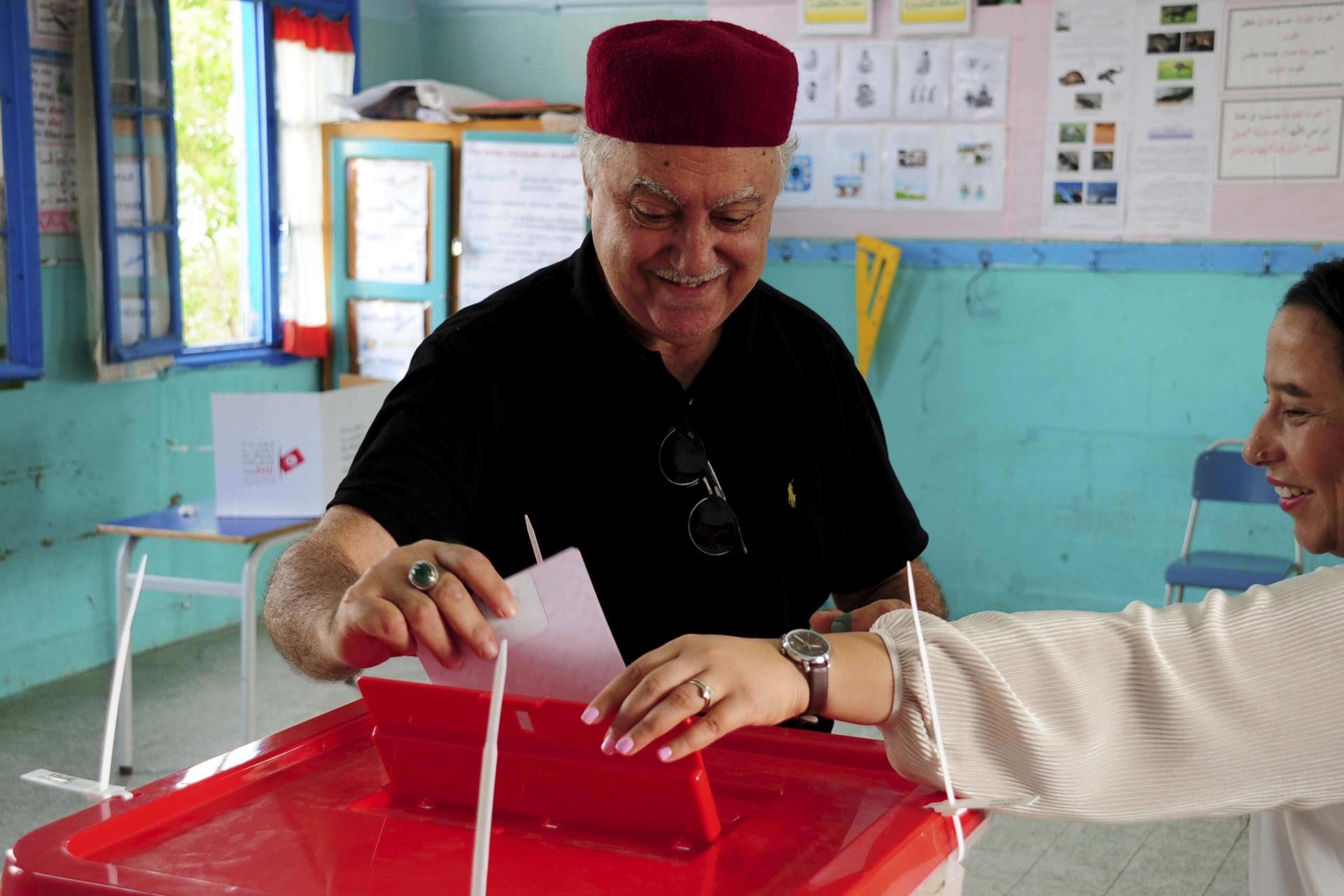 Sunday's vote for parliament is sandwiched between two rounds of a presidential election