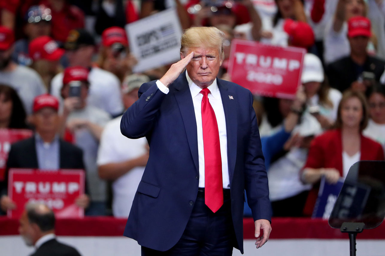 US President Donald Trump gestures during a "Keep America Great" Campaign Rally at American Airlines Center on October 17, 2019 in Dallas, Texas