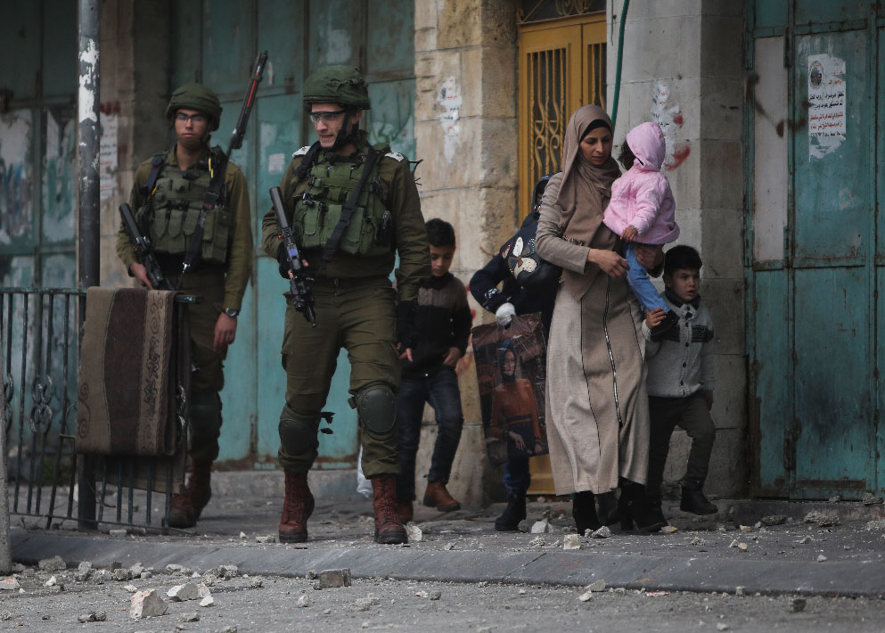 Israeli soldiers deploy in the occupied Palestinian city of Hebron, West Bank