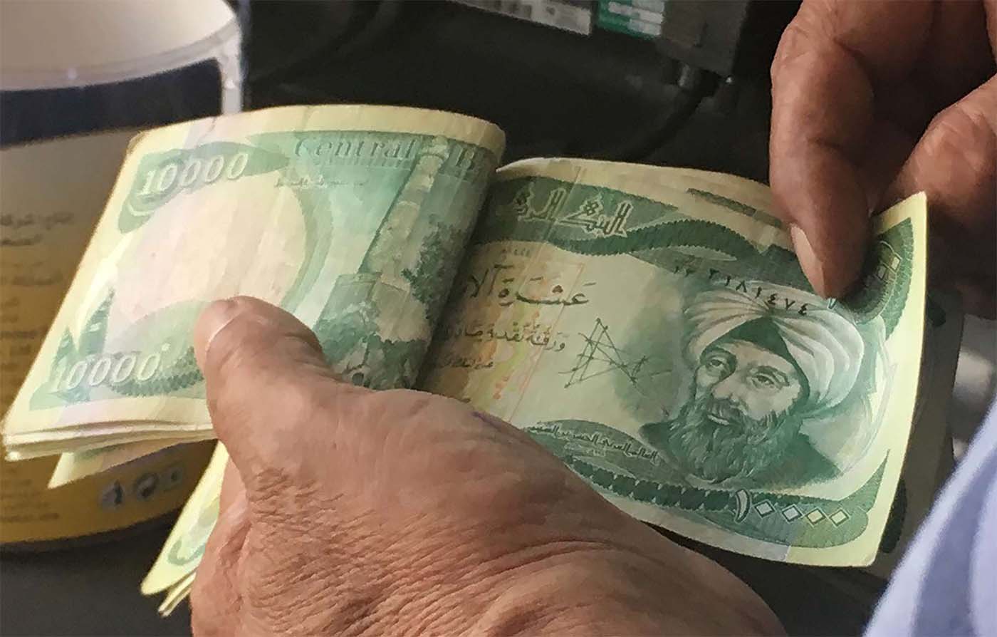 The new rates represent a dramatic reduction from the previous official rate of 1,182 IQD