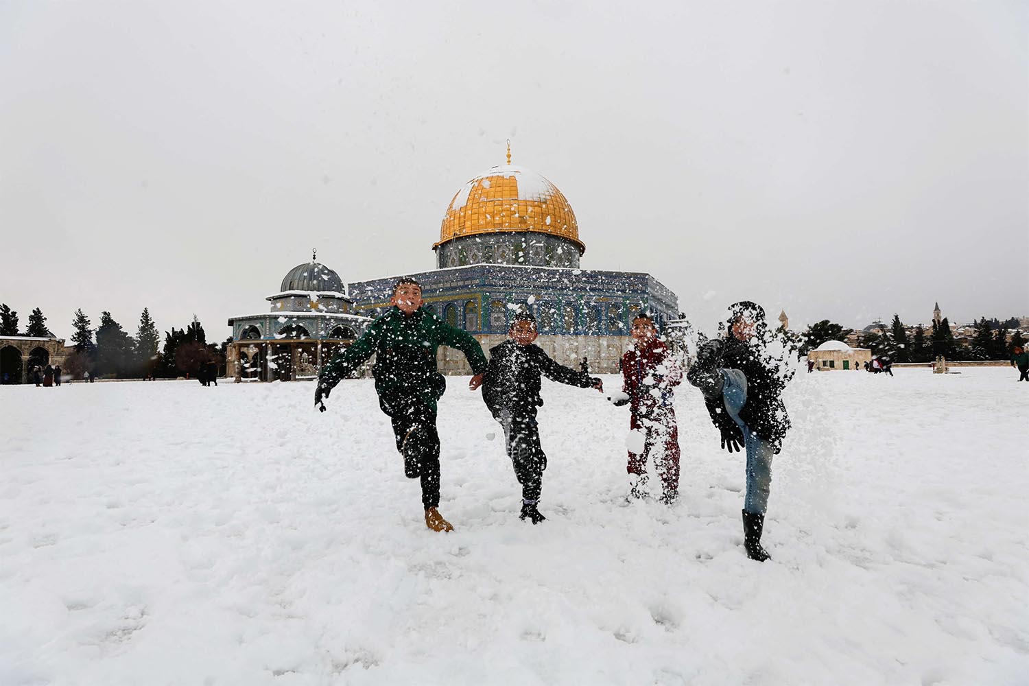 The holy city's iconic golden Dome of the Rock dusted in snow