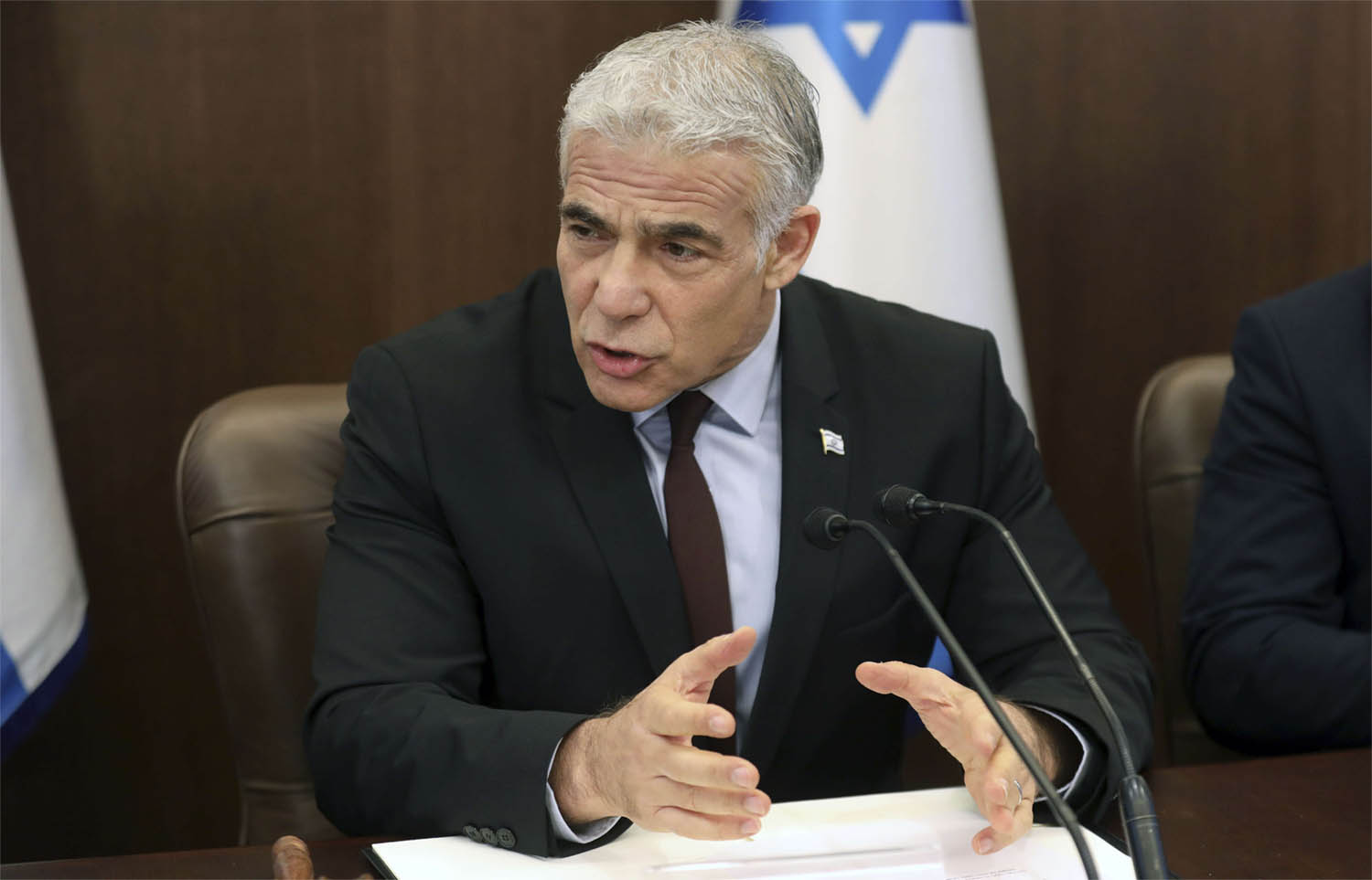 Lapid: We want an end to the unending talks
