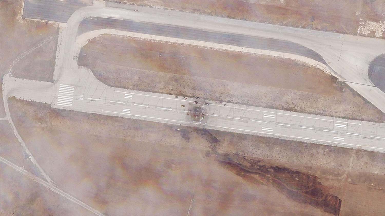 The runway damage after an Israeli strike targeted the Aleppo International Airport