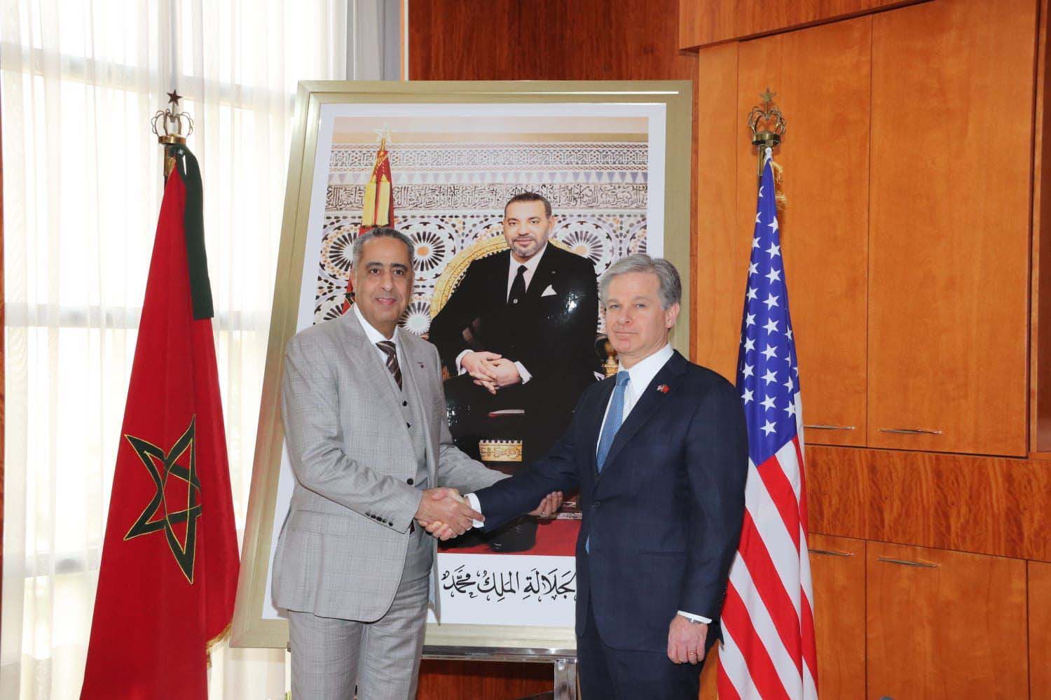 Hammouchi shaking hands with Wray