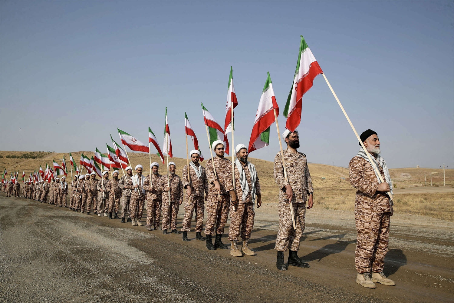 Britain says the sanctioned IRGC officials are responsible for managing the group's financial investments