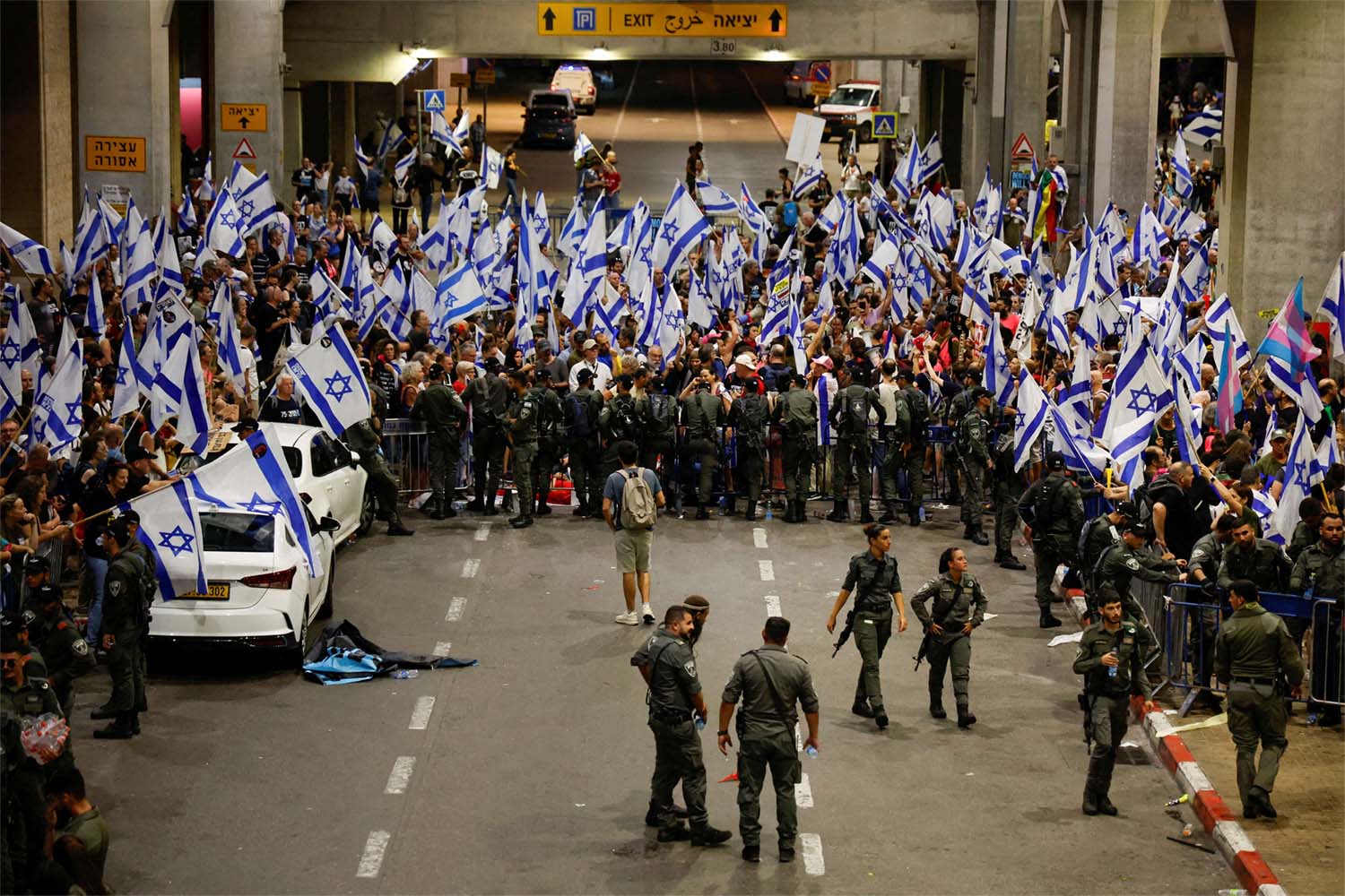Thousands of anti-government protesters converged on Israel's Ben Gurion Airport