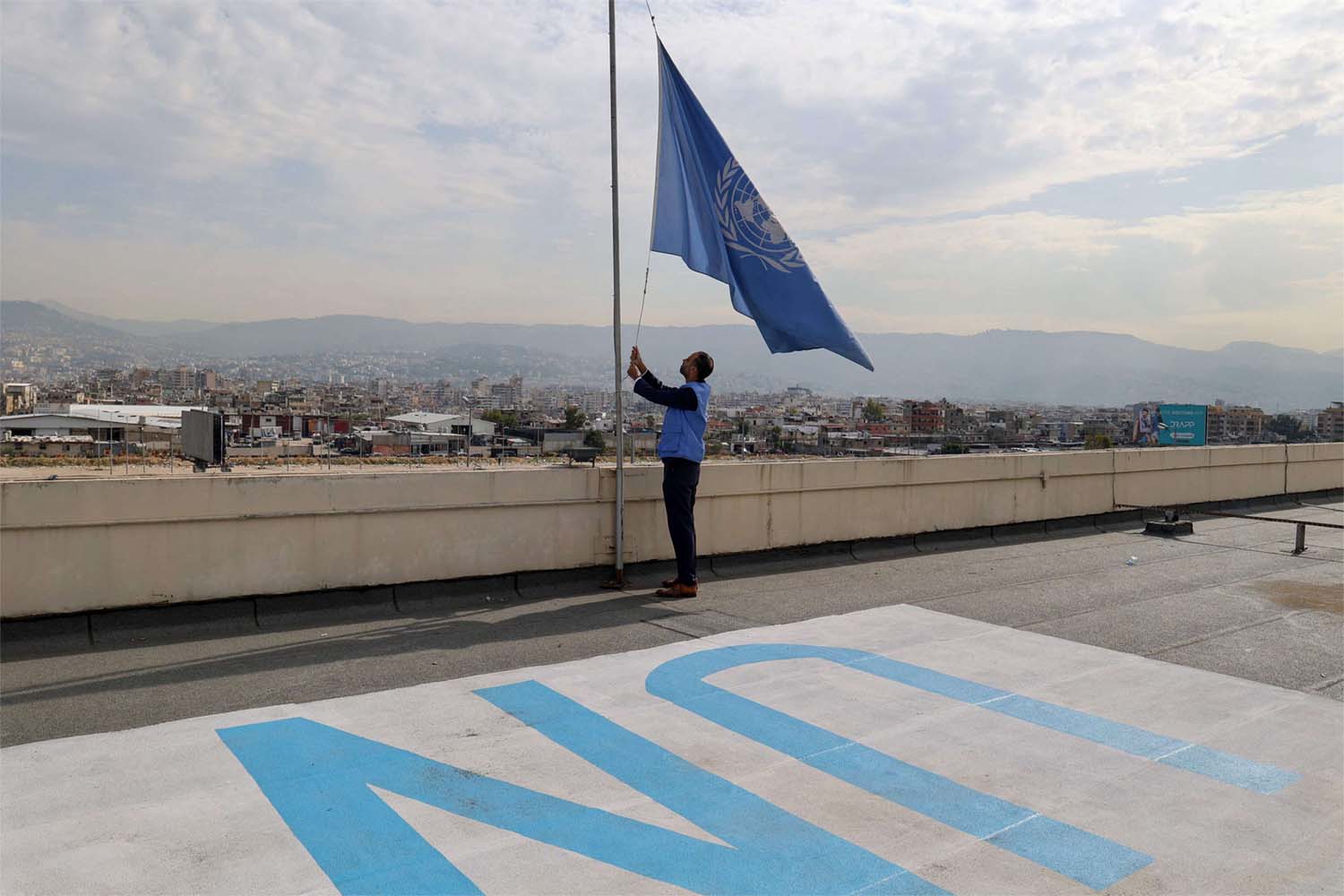 The UN flag flies at half mast
