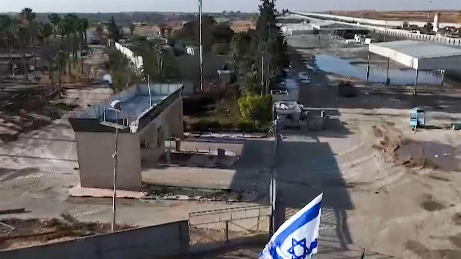 Israeli tanks entering the Palestinian side of the Rafah border crossing
