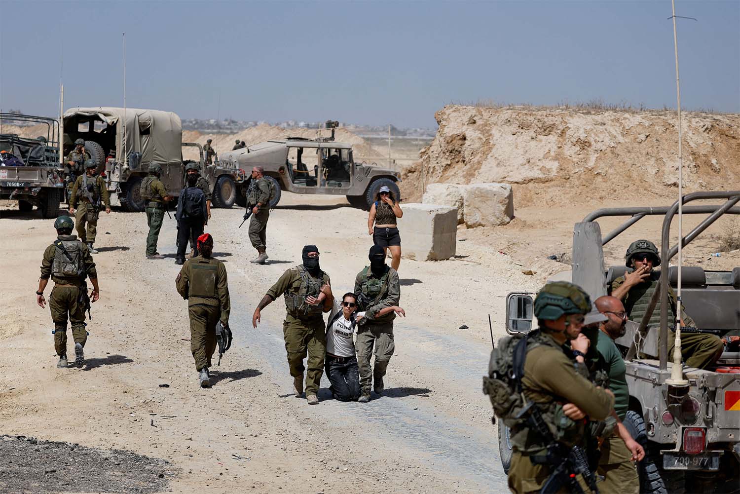 A demonstrator is detained during a protest against Israels interception of the Global Sumud Flotilla which was carrying aid for Gaza