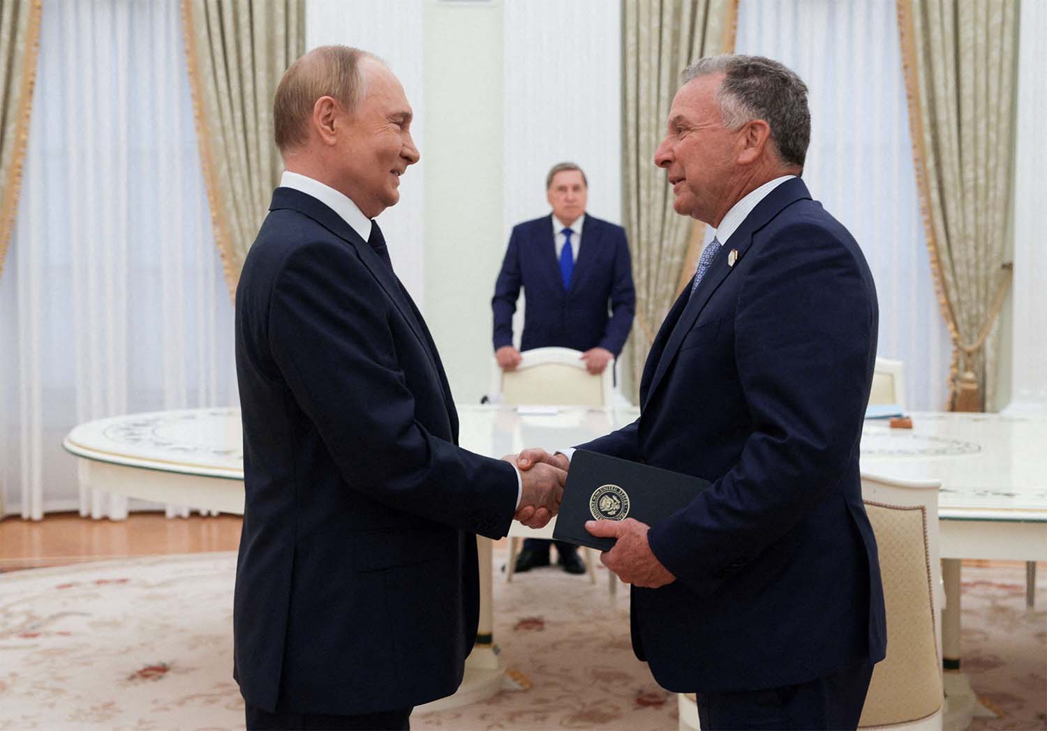 Russian President Vladimir Putin welcomes US President's envoy Steve Witkoff during a meeting in Moscow