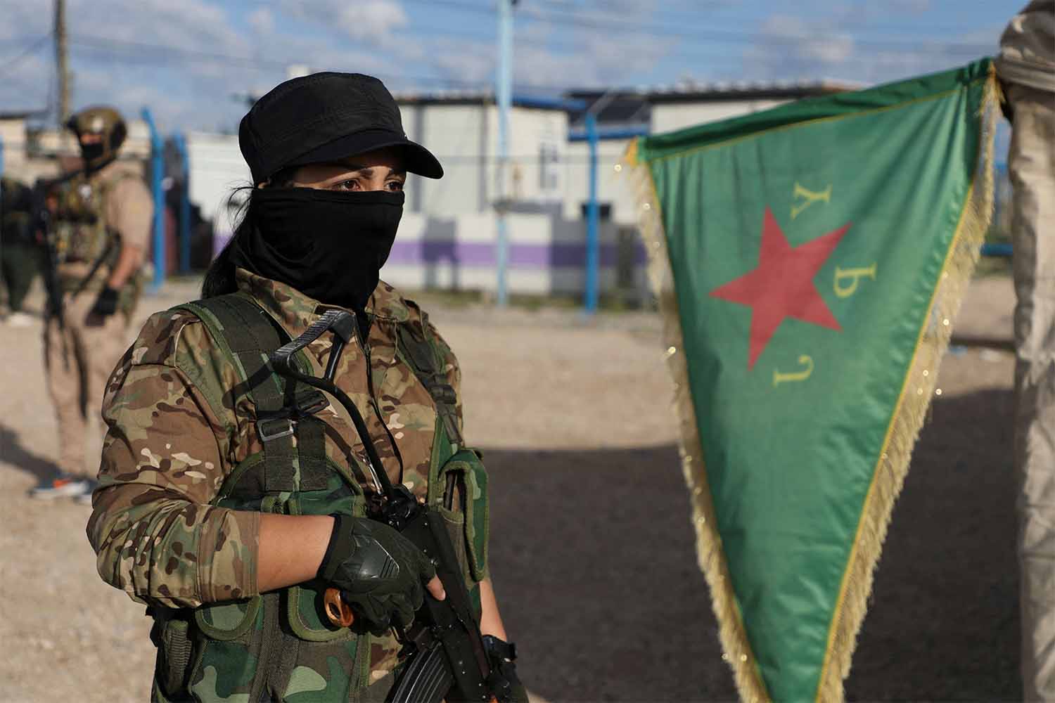 Kurdish internal security forces conduct a security operation in al-Roj camp