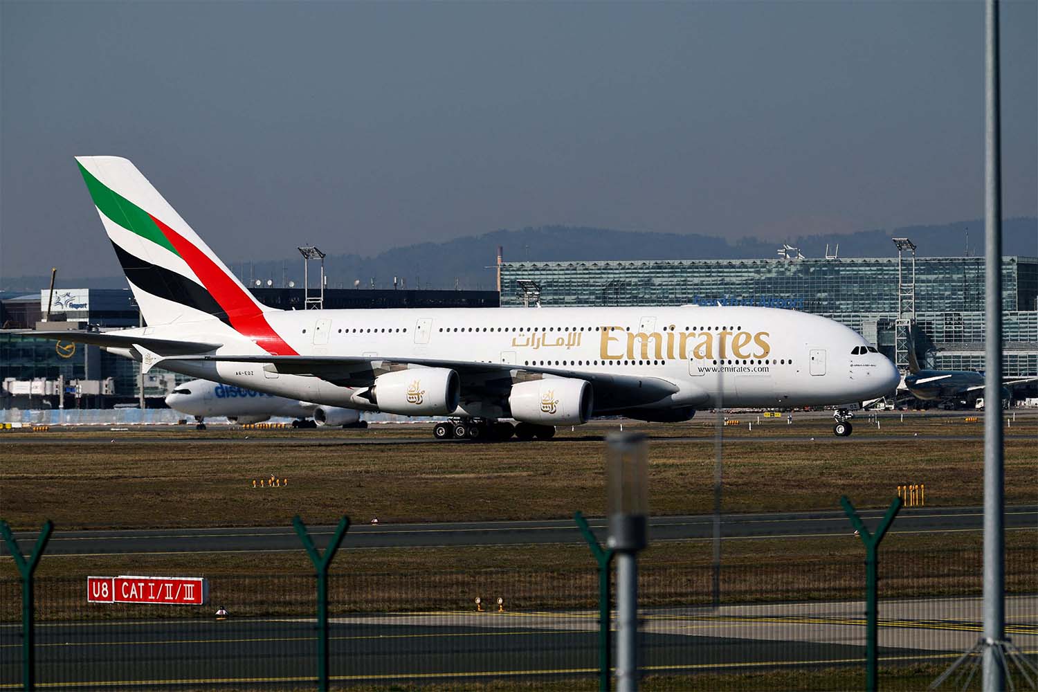 An Emirates plane with German tourists evacuated from the Middle East arrives from Dubai