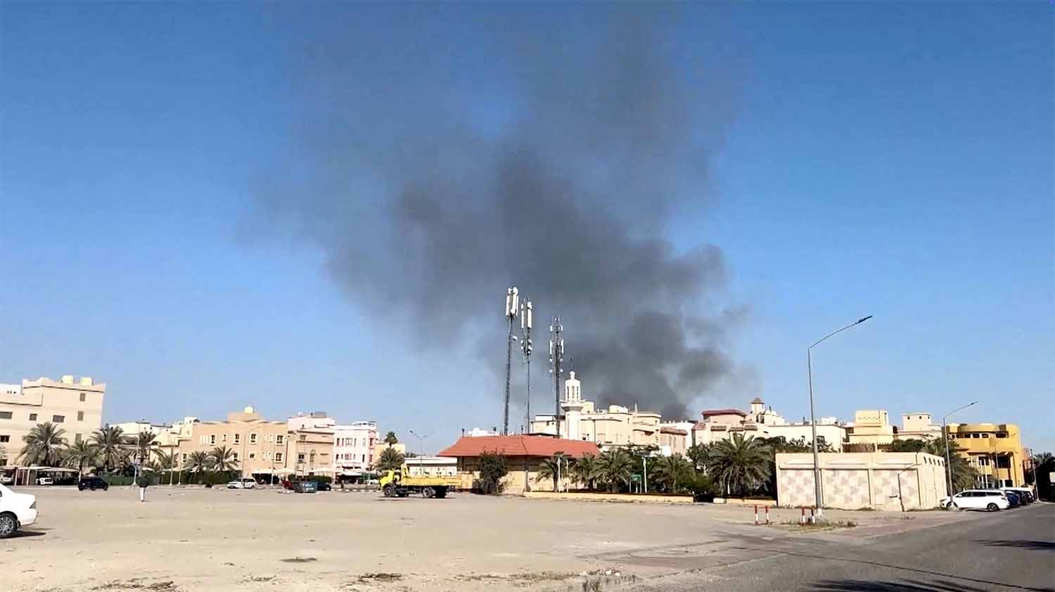 Smoke rises from an area surrounding the US Embassy in Kuwait following an Iranian strike
