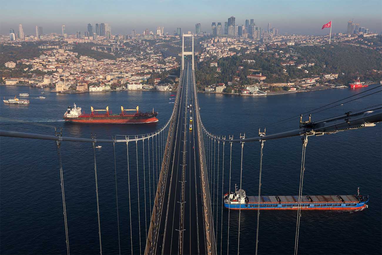 Cargo ships sail through the Black Sea as they are seen from the July 15 Martyrs Bridge, known as the Bosphorus Bridge