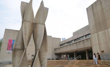 Women enter the Medical Sciences Building at the University of Toronto in Toronto, Ontario, Canada