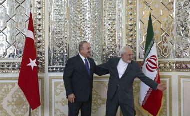 Iranian FM with Turkish counterpart in Tehran, last February