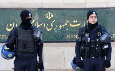 Turkish riot police stand guard in front of the Iranian Embassy during a protest against Iran's role in Aleppo, in Ankara, on December 15, 2016