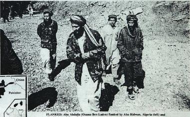 Enaam Arnaout, head of an Illinois Islamic charity, who was shown in the same Arab News report walking next to Bin Laden.
