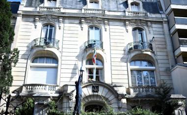 A man cleans the surveillance camera in the grounds of the Iranian Embassy in the French capital Paris.