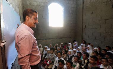 Yemeni children attend class in a house turned into a makeshift school in the southwestern city of Taiz 