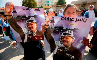 الفلسطينيون يفتقدون الوحدة في الذكرى الرابعة عشر لرحيل عرفات