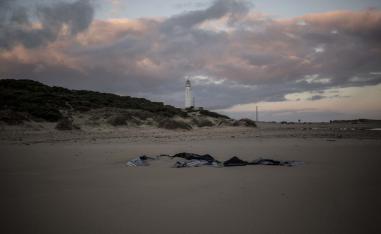 Remains of a dinghy lies on the beach near the village of Canos de Meca in southern Spain, Tuesday, Nov. 6 2018