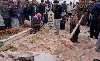 Mourners attend the funeral of Raed Fares and Hammoud al-Jneid in the village of Kafr Nabel in the northwestern province of Idlib on November 23, 2018.