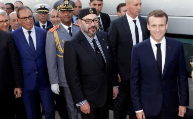 French President Emmanuel Macron (R) and Moroccan King Mohammed VI (C) attend the launch ceremony in Tangiers.