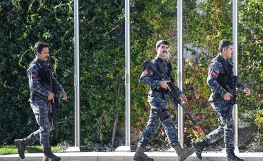 Turkish special force police officers patrol outside the Vahdettin Mansion in Istanbul 