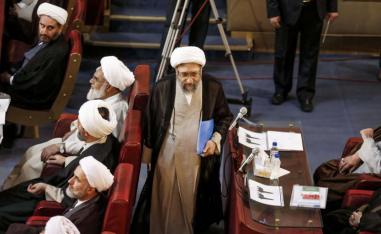 Iranian Judiciary chief Sadeq Larijani (C) attends a session of the Assembly of Experts in Tehran. 
