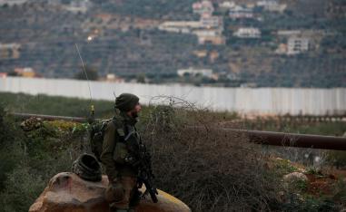 An Israeli soldier guards near the border with Lebanon on December 5, 2018.
